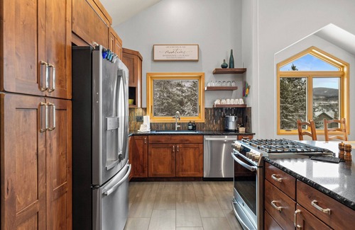 Three Peaks House | Private Wooded Setting with Open-Concept Layout and Updated Kitchen
