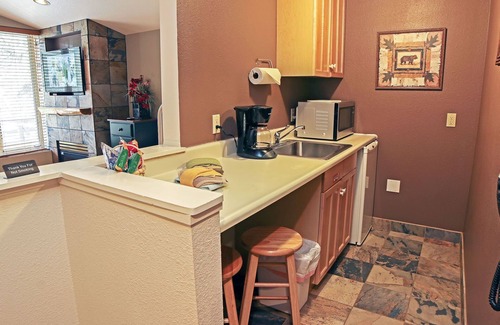 Estes Park Condo | Suite with Two person Jetted tub, Private Patio with Grill and River View.