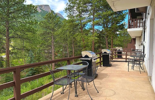 Estes Park Condo | Suite with Two person Jetted tub, Private Patio with Grill and River View.