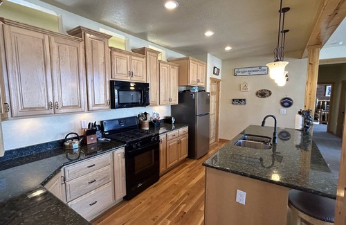 Granby House | Your home away from home with private hot tub, game room, and majestic views
