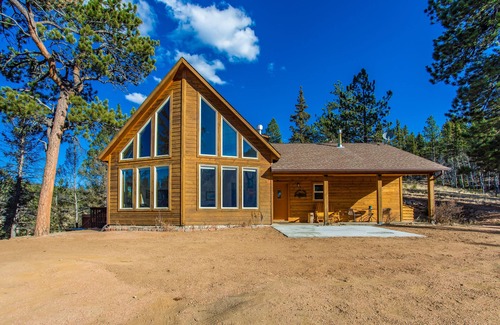 Florissant House | Your mountain getaway on 30 pristine acres! Beautiful home with hottub, stream.
