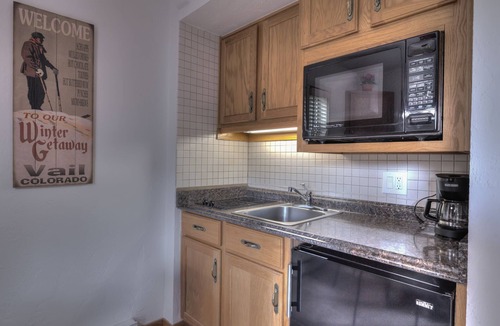 Vail Apartment | 1 min. to slopes!Wake up & Ski! Steps to ski lift/gondola, shops & dining!