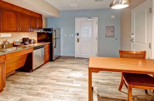 Greeley Apartment | 2 Connecting Suites at a Hotel