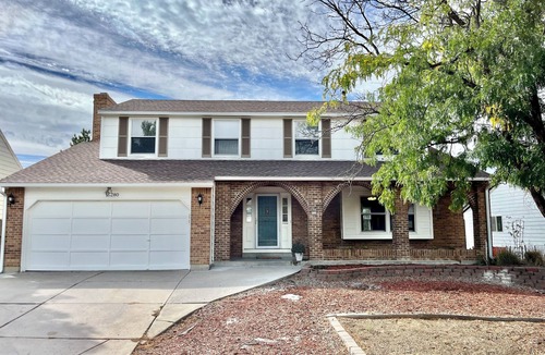 Aurora House | 4 Bedroom Home with 2 living rooms, patio, & backyard.