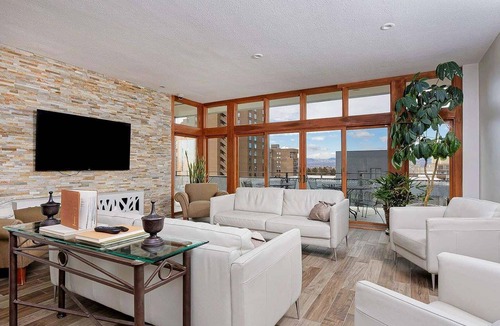 Cheesman Park Condo | Beautiful bedroom with private bathroom in the heart of Denver