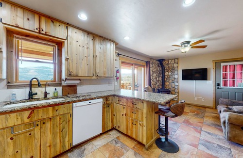 Alpine Village Cabin | Beautiful mountain-view cabin with covered deck, grill, fireplace & washer/dryer