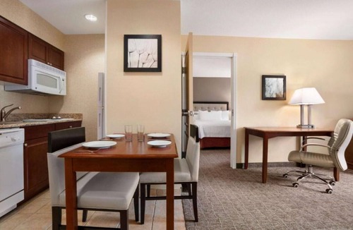 Ken Caryl House | Between the Rockies and a car race!