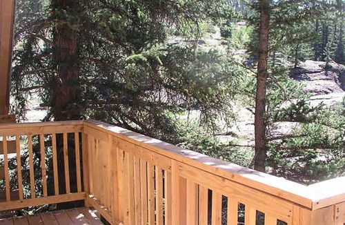 Lake City House | Bobcat Log home 4 bd 2 bth on the river waterfall view porch ATV drive-in/out