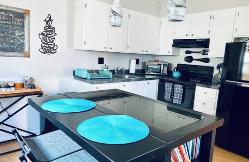 University Park Apartment | Boutique Studio Apartment Hotel across from CSU in Old Town Fort Collins! Like it's namesake, Studio FoCo (short for Fort Collins) is the perfect blend of special-occasion luxury and at-home comfort. Large windows overlook the tree-lined street of th