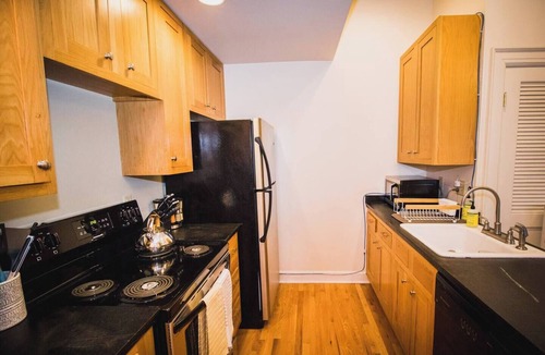 Greeley Apartment | Brick & Balcony Greeley Retreat