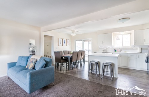 Wheat Ridge Apartment | Bright & Chic Getaway Game Room Covered Deck