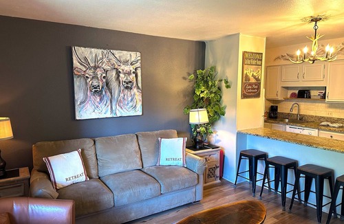 Estes Park Condo | Bright, newly updated condo with river view off deck, close to the National Park