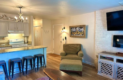 Estes Park Condo | Bright, newly updated condo with river view off deck, close to the National Park