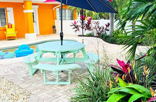 Holmes Beach House | Charming one floor, 2-bedroom house steps to the beach, private heated pool