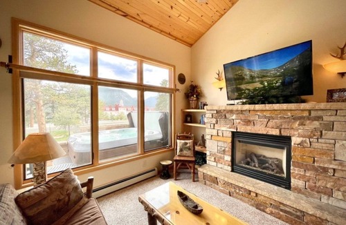 Stanley Hills Condo | Charming woodsy condo with private hot tub and Rocky Mountain views!