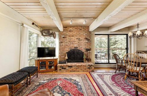 Aspen House | Chateau Eau Claire Unit 18, Spacious Condo Overlooking the River with a Private Deck