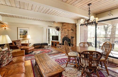 Aspen House | Chateau Eau Claire Unit 18, Spacious Condo Overlooking the River with a Private Deck