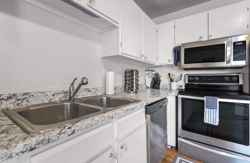 Village Seven Apartment | Cheerful Chalet! Centrally Located w BBQ Pit
