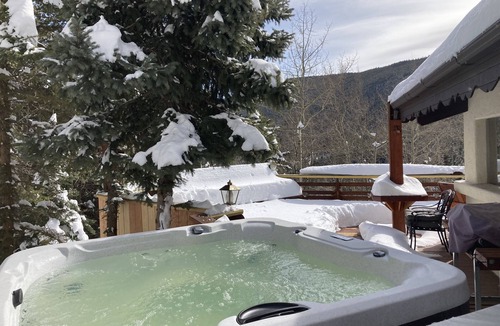 Evergreen Ski Chalet | Cheerful chalet with hot tub! Sweeping views, close to town and trails!