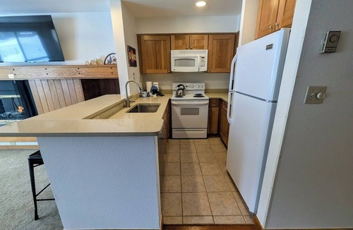 Lakeside Village Condo | Condo with pool and hot tub onsite & free shuttle