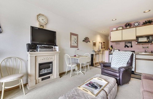 Frisco Condo | Corner studio near Main Street.