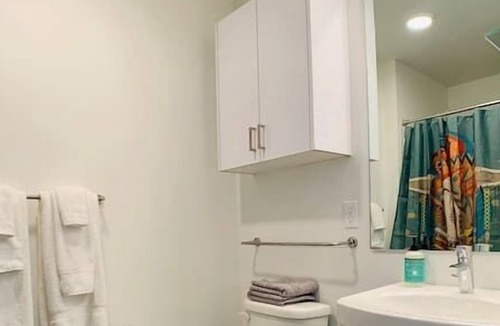 Roosevelt Condo | Corner unit studio with natural light and premium amenities for a very comfortable quick stay.