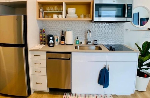 Roosevelt Apartment | Corner unit studio with natural light and premium amenities for a very comfortable quick stay.