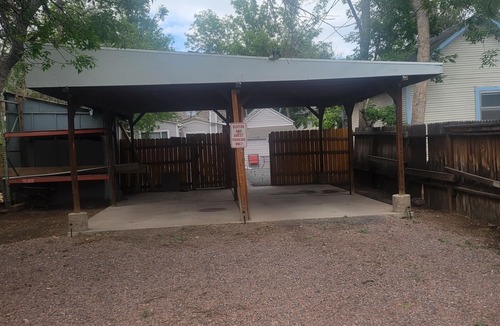 Central Colorado Springs Cottage | Cozy downtown cottage w fenced yard, firepit and covered parking