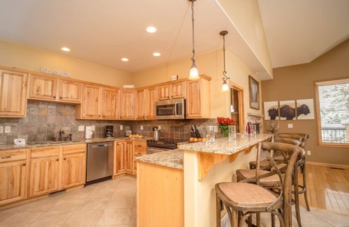 Stanley Hills Condo | Cozy up in this spacious condo with two fireplaces, large deck, and hot tub!