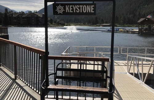 Lakeside Village Condo | Cozy, updated condo with lake views and ski shuttle right out front!