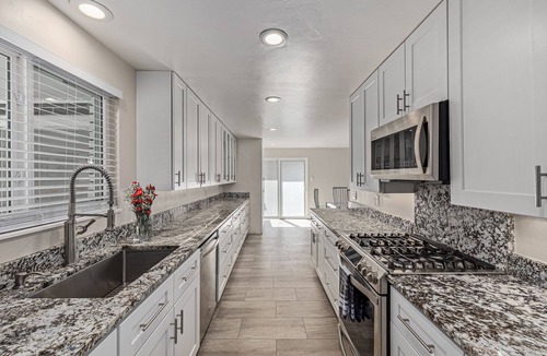 Southeast House | Creekside Getaway Near the City! 4 King beds and 2 queens!