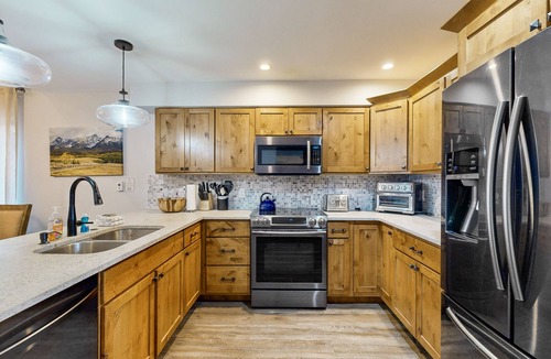 Winter Park House | Creekside townhome on bus route with lovely views, fireplace, W/D - dog-friendly