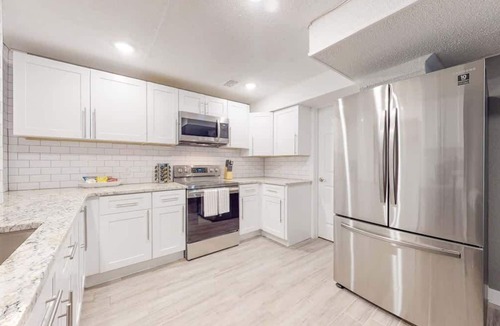 Twin Lakes House | Denver 2 King Beds, Lower Unit with Large Backyard