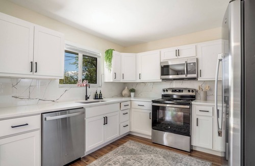 Northglenn House | Denver Retreat w/Hot Tub & Game Room – Sleeps 16 ~ 6 BR
