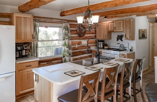 Rainbow Valley Cabin | Dog-friendly cabin with mountain views, fireplace & wraparound deck