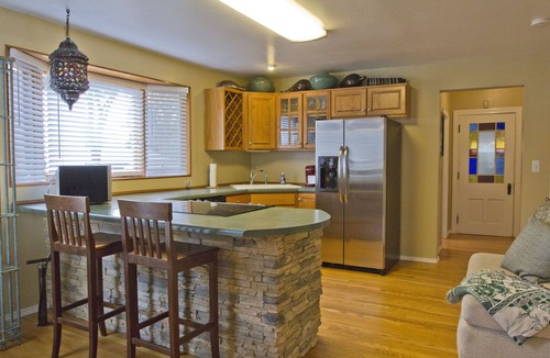 Colorado Springs House | Easy Walk to Shops, Restaurants and parks. Pet Friendly with fenced backyard.