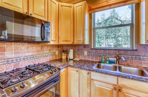 Wildernest Condo | Elegant & spacious home with fireplaces, deck & garage access