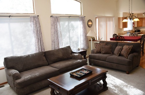 Northeast Colorado Springs House | Enjoy the large patio and shaded back yard of this large home with 2 kitchens