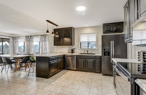 Park Vista House | Evergreen Luxe! Backyard Oasis w/Pool & Hot Tub!