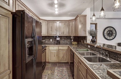 Four O'Clock Condo | Experience ski in/out cozy mountain living at Tyra Riverbend 213!