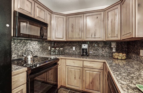 Four O'Clock Condo | Experience ski in/out cozy mountain living at Tyra Riverbend 213!