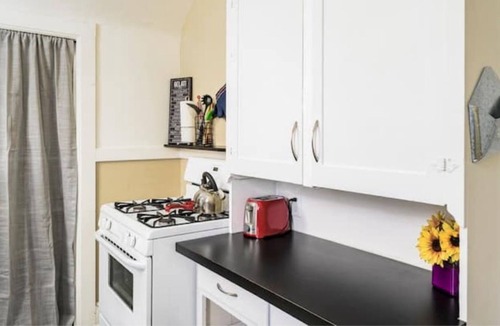 Speer Apartment | EXPLORE CO -Private upper unit and patio. Central.