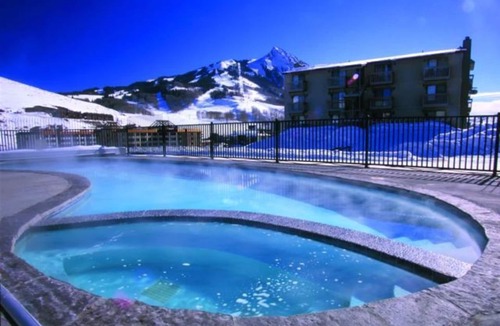 Crested Butte Condo | Family friendly, 4BR condo. Walking distance to slopes, hot tub & town shuttle!