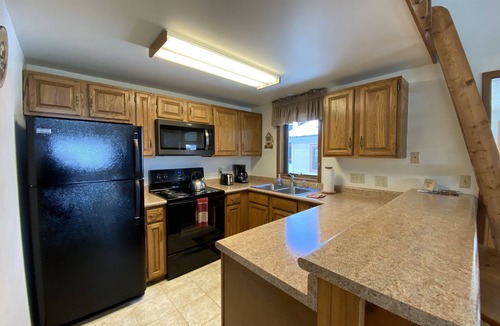 Crested Butte Condo | Flowers & bike rides to the lifts from Crested Mountain North 2 bedroom Condo!