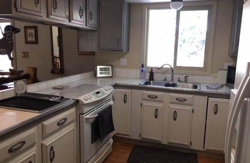Woodland Park Bed & Breakfast | Furnished bedroom in our Home with full size bed, shared bath