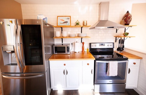 Lafayette House | Good Vibe Bungalow w/Hot Tub + Fire Pit + Fenced Yard. Heart of Old Town