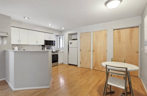 Speer Condo | Hip Historic Baker Area Condo - Individual Garage Parking Included!