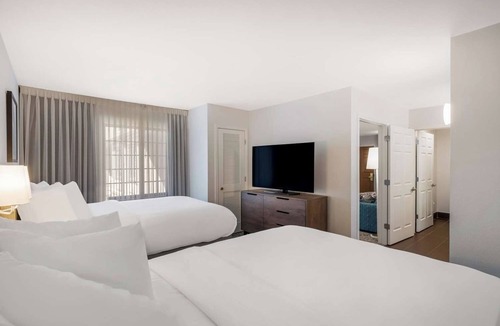 Lone Tree Hotel | Home Away From Home - Spacious Suite with Living Space | Outdoor Pool