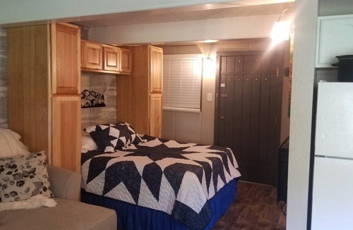 Glenwood Springs Condo | Homey and cozy with a large table for great feasts or epic card games.