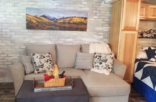 Glenwood Springs Condo | Homey and cozy with a large table for great feasts or epic card games.